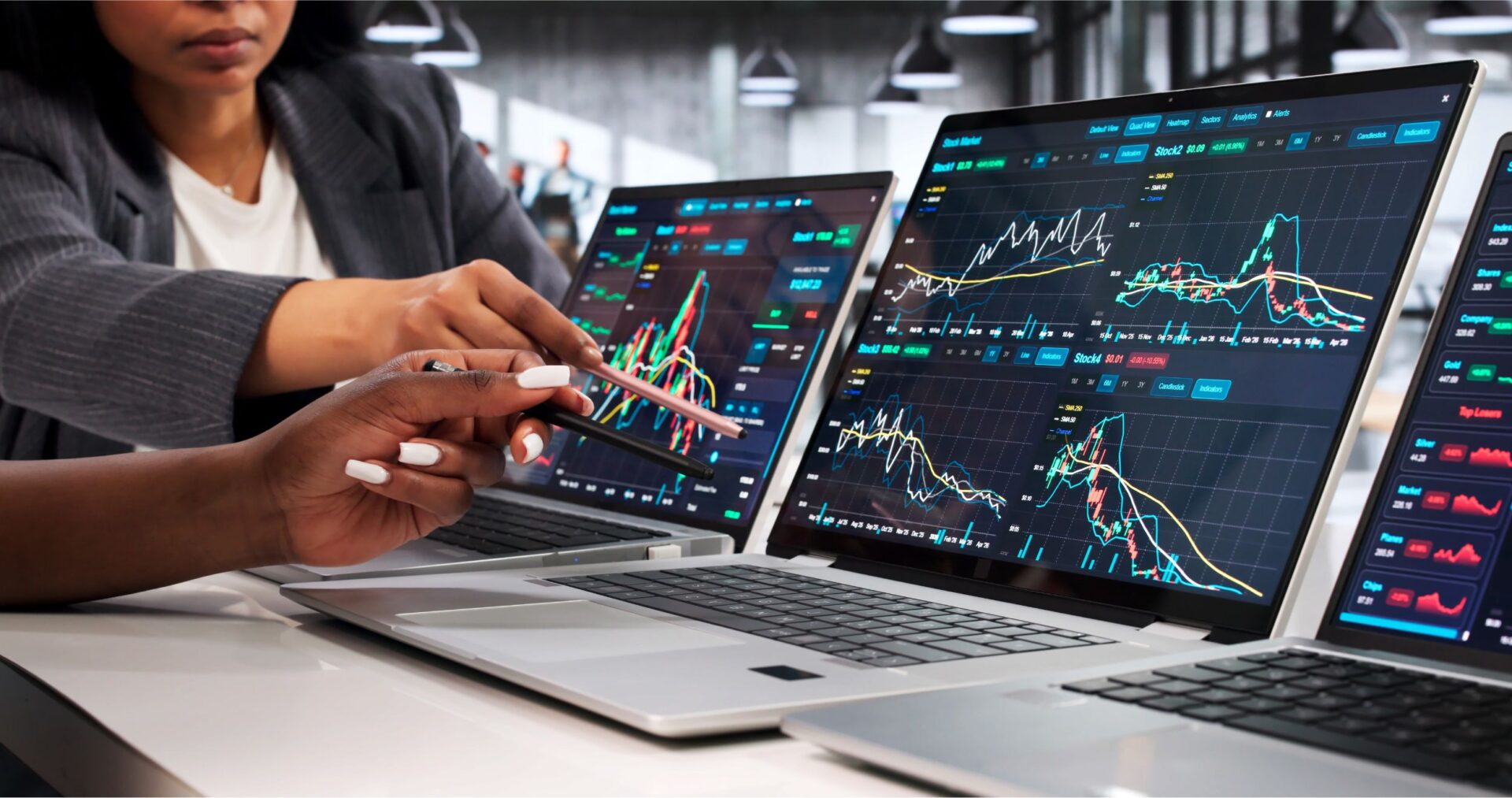 Financial Analyst Studies Stock Market Data Carefully On Laptop, Planning Investments.
